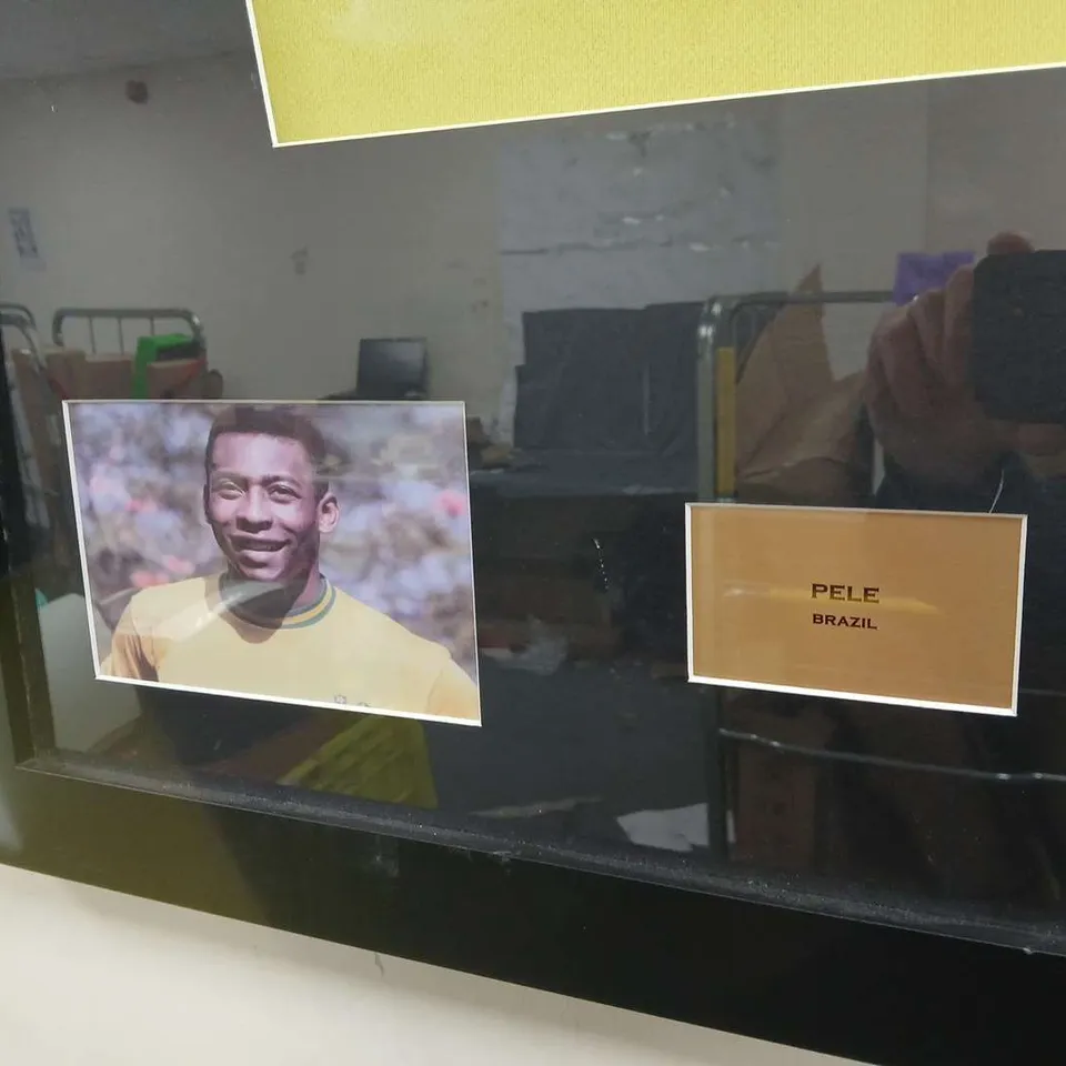 FRAMED PELE PRESENTATION WITH THE ICONIC #10 BRAZIL SHIRT SIGNED 