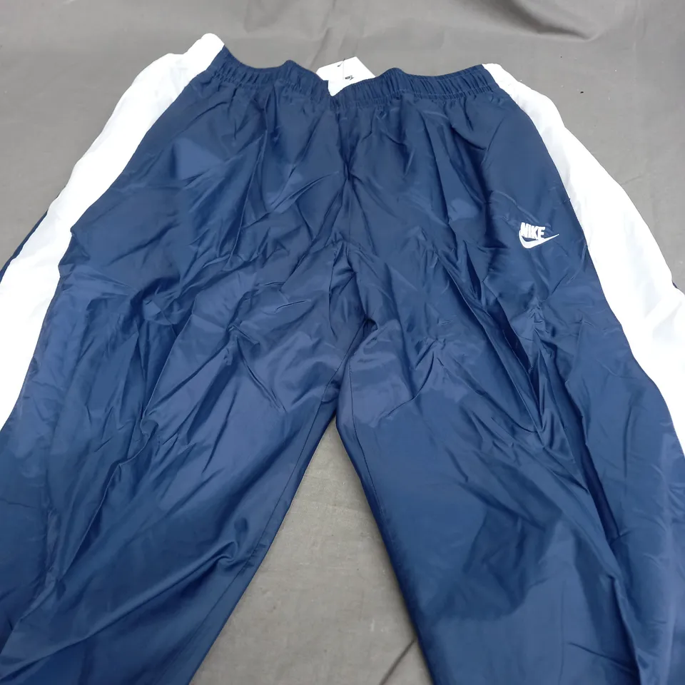 NIKE NAVY & WHITE TRACKSUIT PANTS - MEDIUM