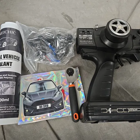 box of assorted car items to included - tools - sealant - cables 