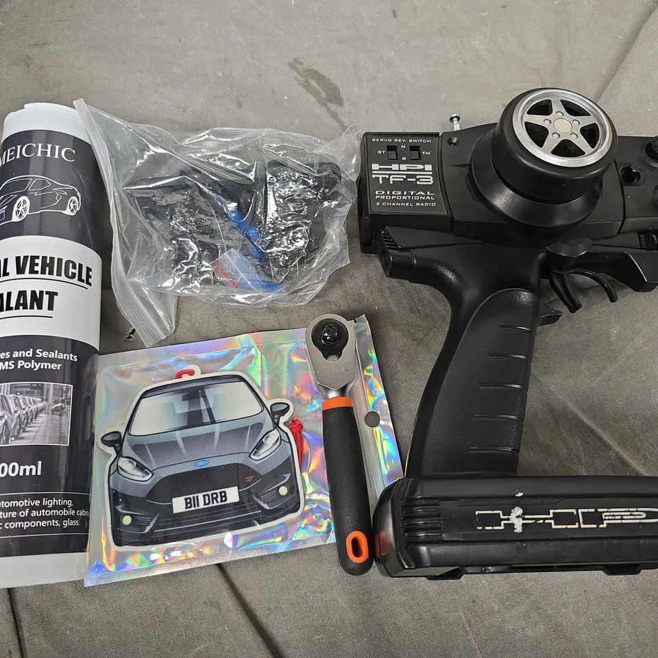 box of assorted car items to included - tools - sealant - cables 