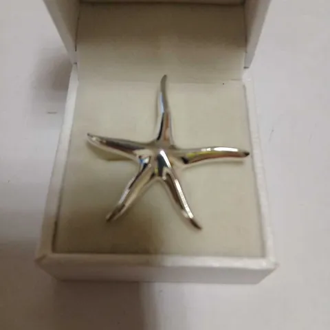 STARFUSH PENDANT- NO CHAIN. STERLING SILVER