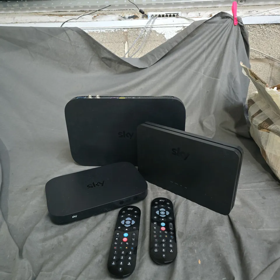 SKY TV SET-TOP BOXES AND WIFI ROUTERS WITH TWO REMOTES – INCLUDES POWER ADAPTER X 3 ITEMS.