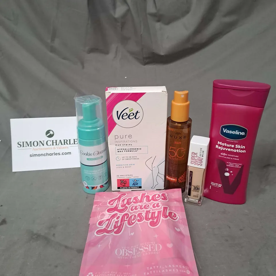APPROXIMATELY 20 ASSORTED COSMETIC PRODUCTS TO INCLUDE VEET WAX STRIPS, VASELINE MATURE SKIN LOTION AND MAYBELLINE FOUNDATION