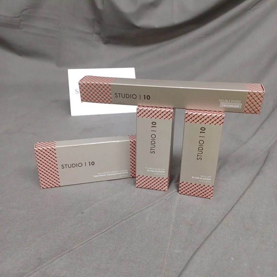 LOT OF 4 STUDIO 10 BEAUTY PRODUCTS TO INCLUDE FACE BRUSH AND SKIN REPAIR FOUNDATION