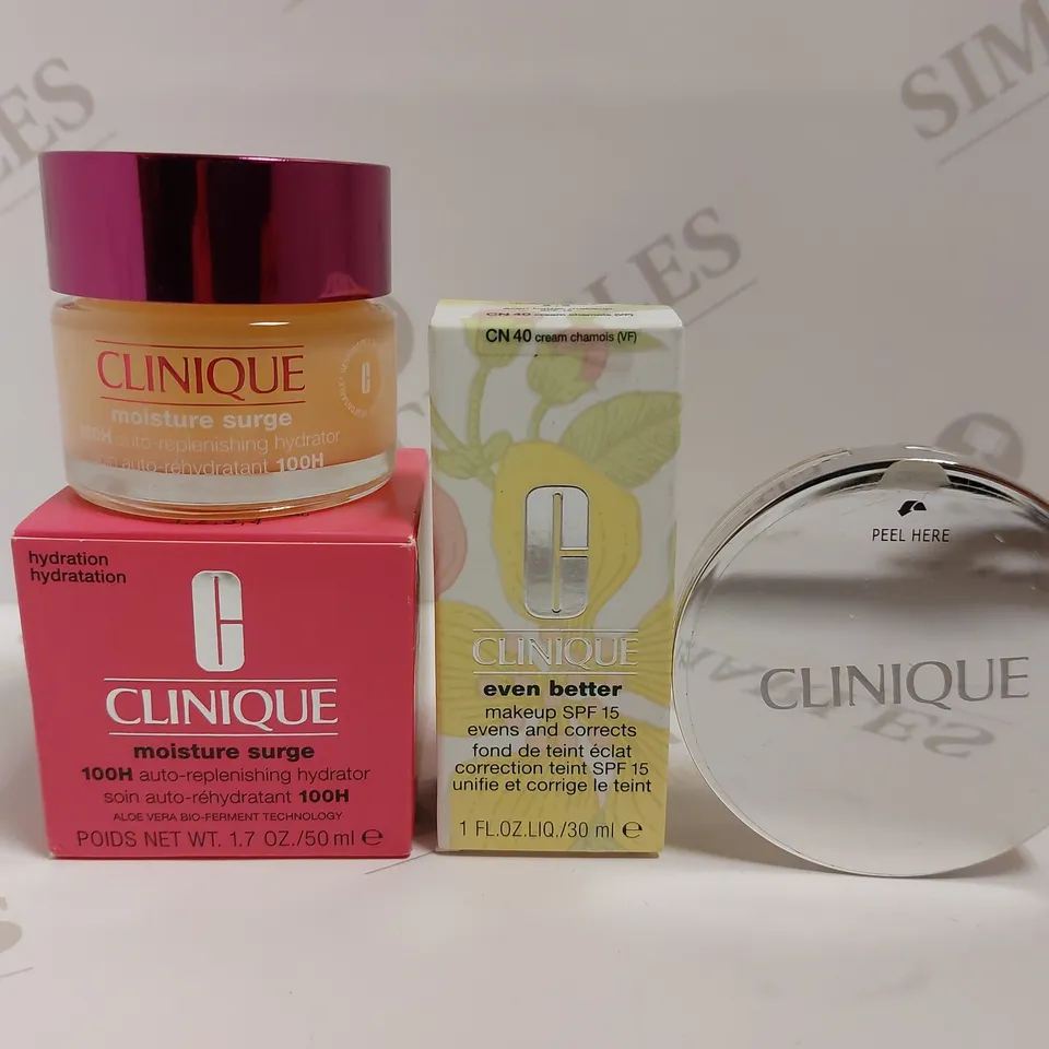 BOX OF 3 CLINQUE ITEMS TO INCLUDE MOISTURE SURGE, NAKEUP CORRECTION CREAM, STAY SHEER PRESSED POWDER