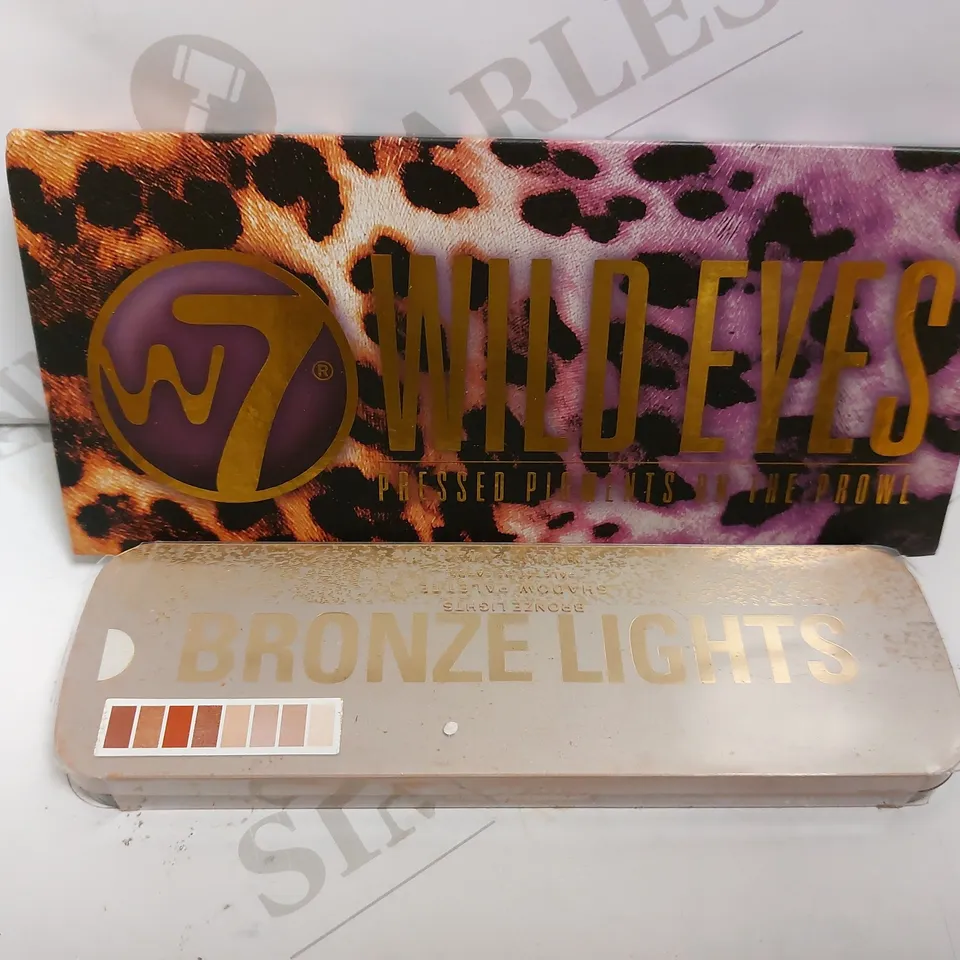 TWO PALETTES TO INCLUDE W7 WILD EYES PRESSED PIGMENT AND REVOLUTION BRONZE LIGHTS SHADOW PALETTE