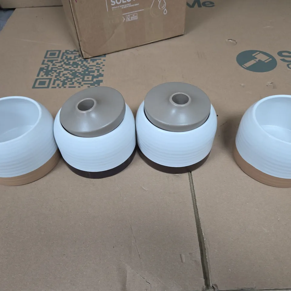 SET OF FOUR JARS WITH TWO LIDS 