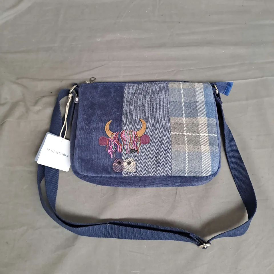 EARTH SQUARED COW MESSENGER BAG IN NAVY 