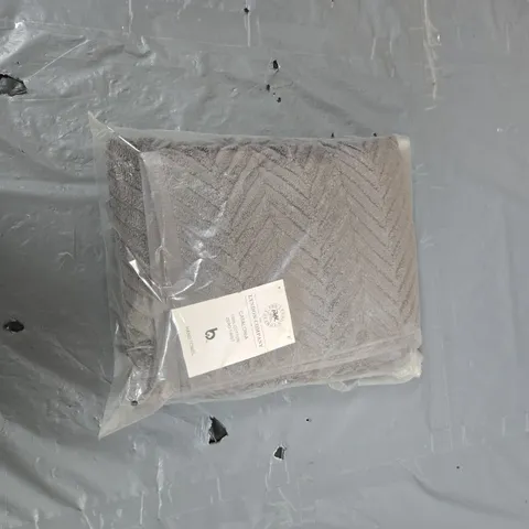 CHEVRON PATTERN BATH TEXTILE IN SEALED PLASTIC BAG. LYNDON COMPANY