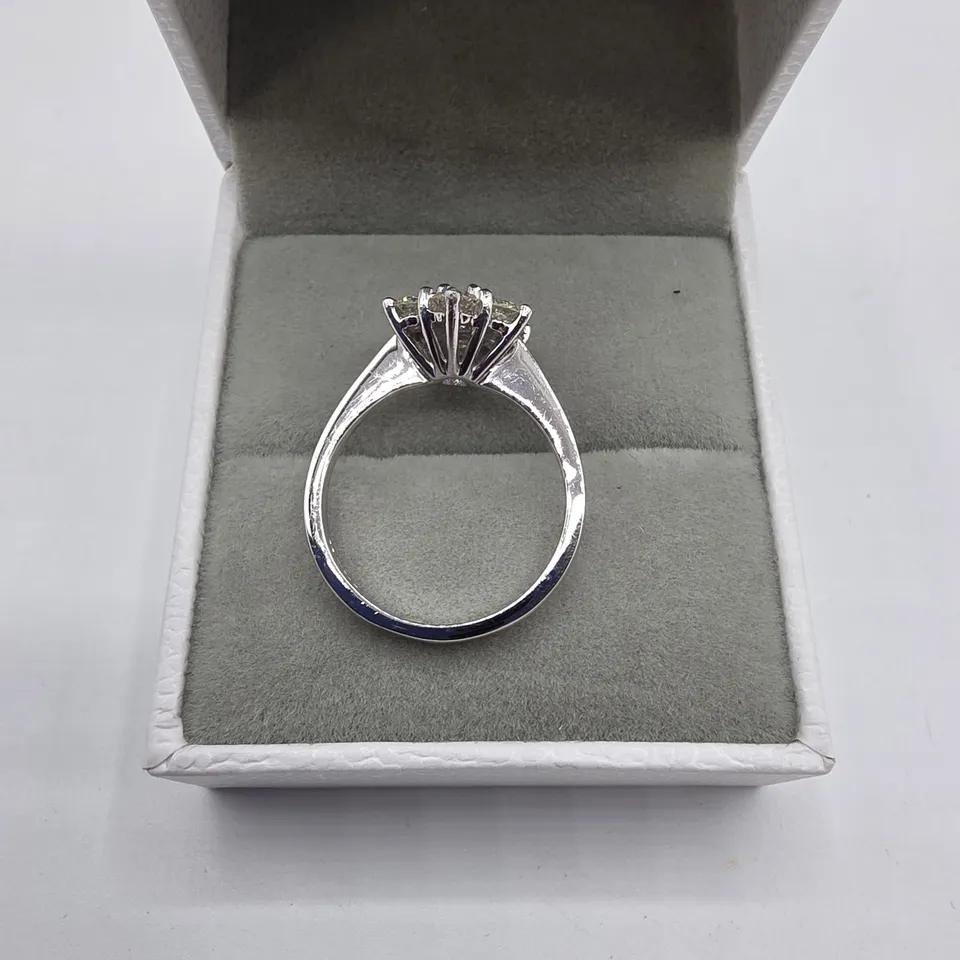 PLATINUM DAISY CLUSTER RING SET WITH NATURAL DIAMONDS WEIGHING +-1.06CT