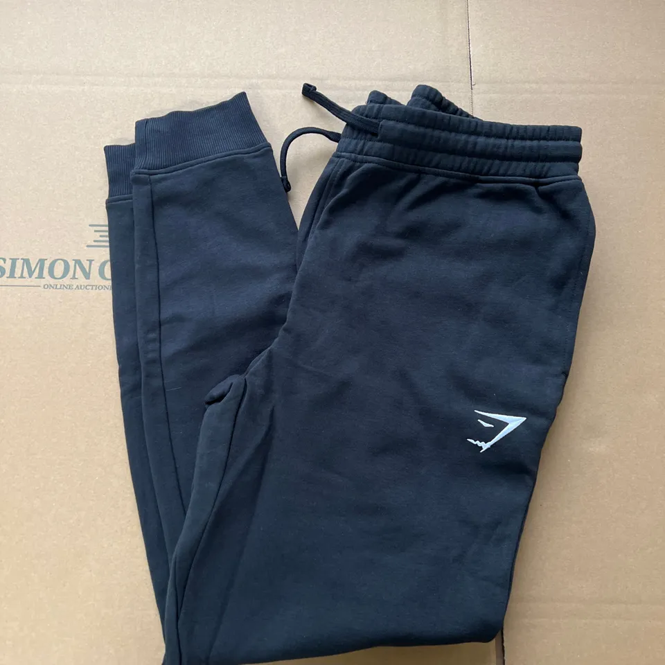 GYMSHARK CREST JOGGERS IN BLACK SIZE MEDIUM