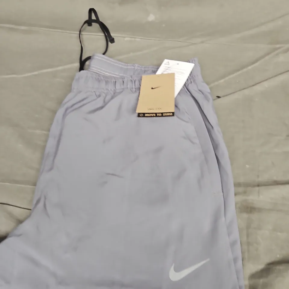 NIKE LOGO TRACKSUIT BOTTOMS - SIZE LARGE