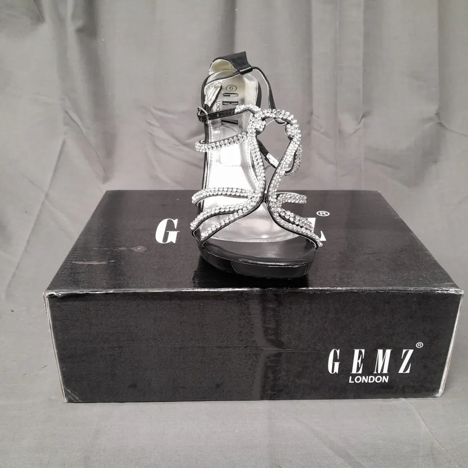 BOX OF APPROXIMATELY 12 ASSORTED PAIRS OF GEMZ LONDON OPEN TOE STRAPPY HEELED SANDALS IN VARIOUS SIZES