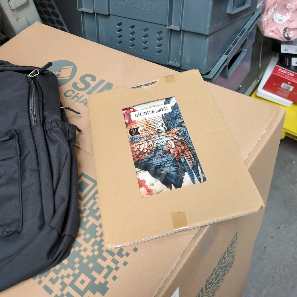BLACK RUCKSACK WITH FRONT POCKET INCLUDED IN A BOX FULL OF ASSORTED HOUSEHOLD ITEMS.