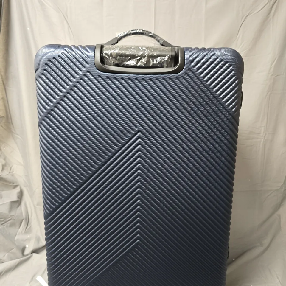 BLOOMLITE BLUE HARD-SHELL SUITCASE WITH 4 WHEELS - DIAGONAL RIBBED TEXTURE (136L)