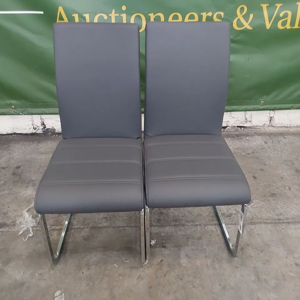 PAIR UPHOLSTERED DINING CHAIRS GREY PU ON CHROME FRAMES 
