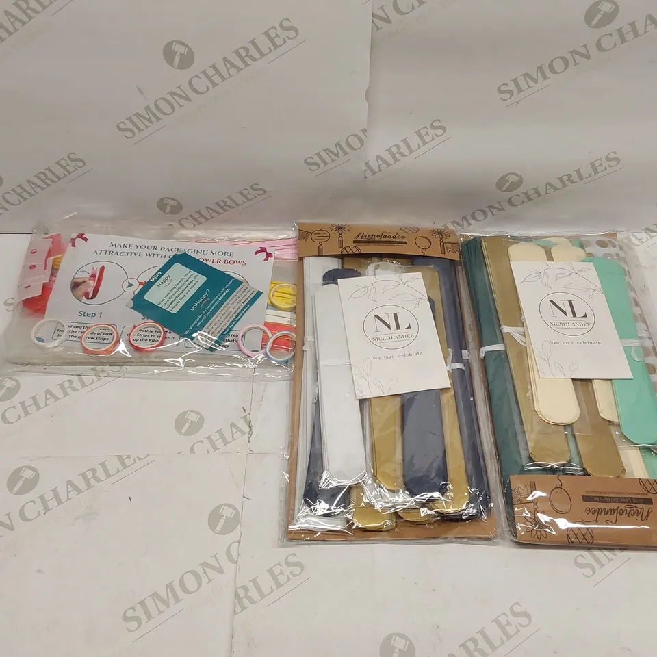 BOX OF APPROXIMATELY 10X60PCS BRAND NEW GIFT BAGS WITH FLOWER BOWS AND 7X NICROLANDEE PARTY DECORATION SETS