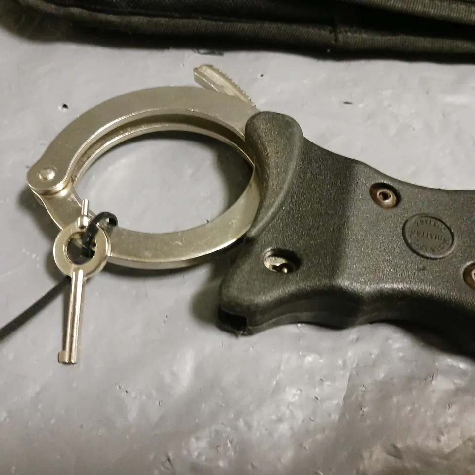 HIATTS HANDCUFFS IN CARRY CASE