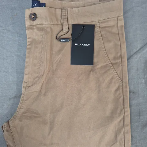 BLAKELY TROUSERS IN SAND SIZE LARGE