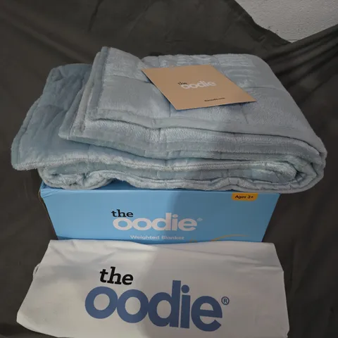 BOXED THE OODIE WEIGHTED BLANKET IN BLUE