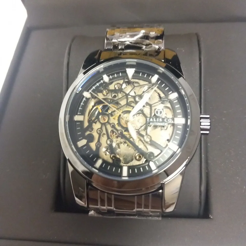 MEN’S TALIS CO 7820 AUTOMATIC WATCH – BLACK SKELETON DIAL AND CASE – BLACK STAINLESS STEEL STRAP – GLASS BACKCASE- £599