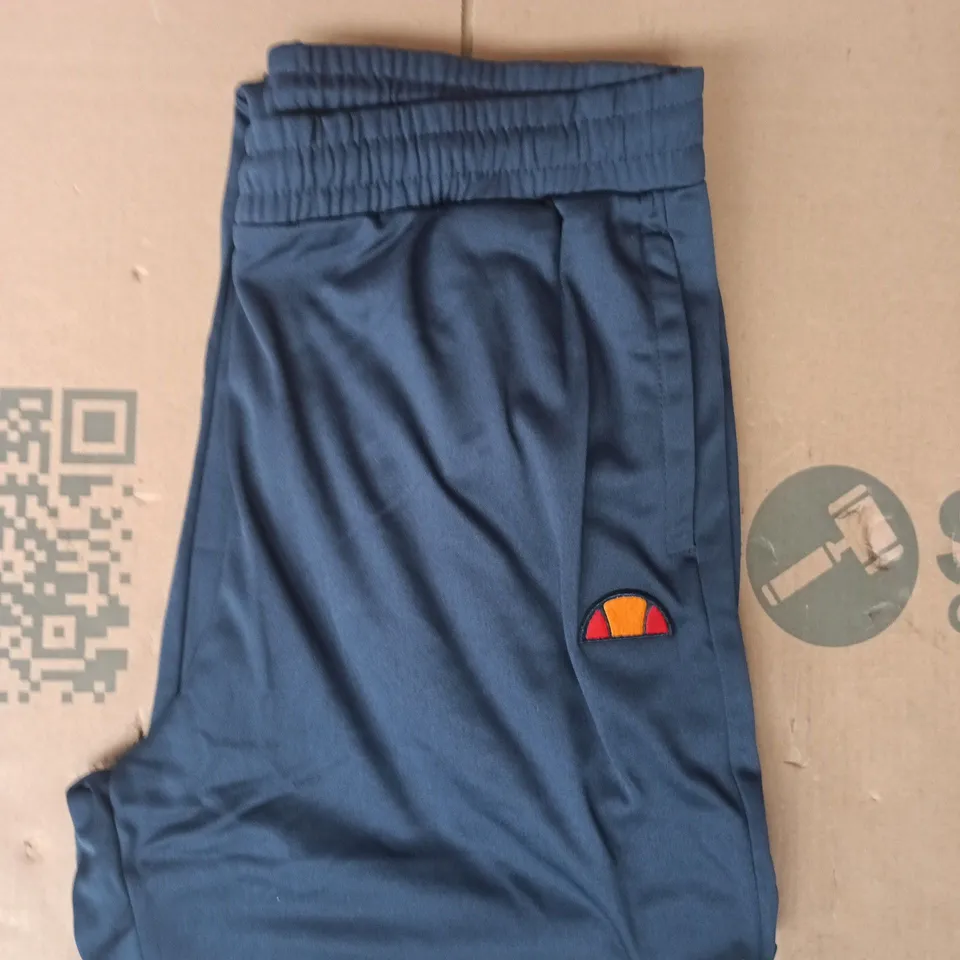 ELLESSE JOGGERS IN NAVY SIZE LARGE