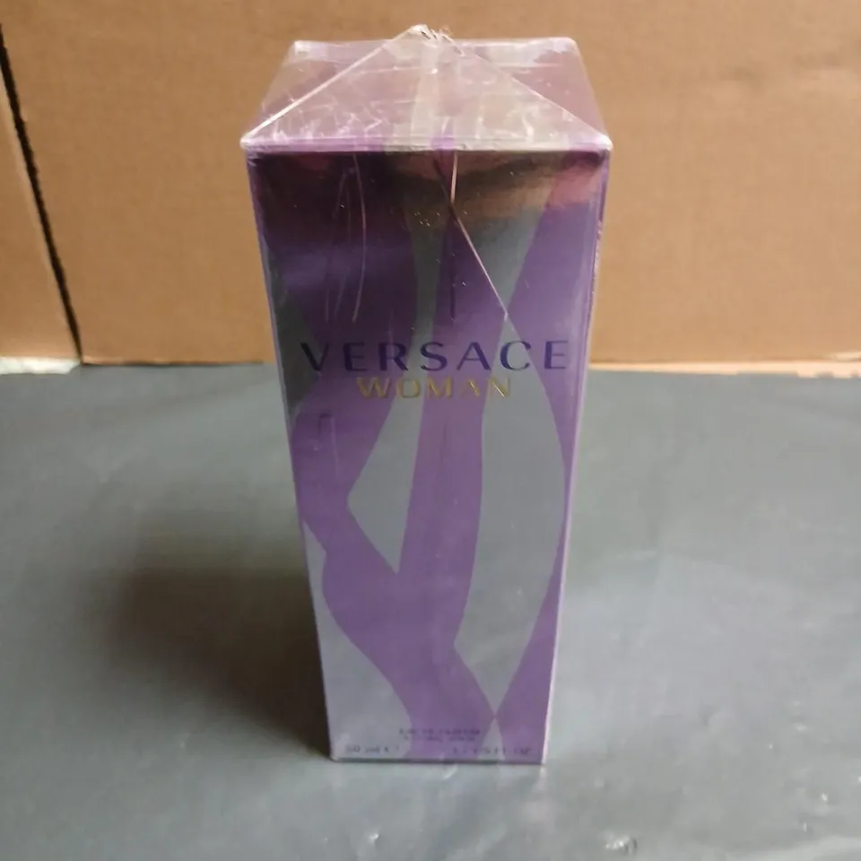 BOXED AND SEALED VERSACE WOMAN EAU DE PARFUM SPRAY 50ML