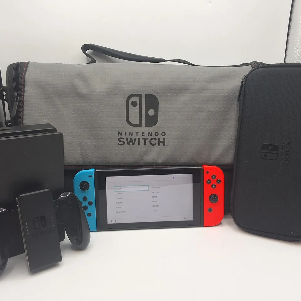 NINTENDO SWITCH HANDHELD CONSOLE WITH NINTENDO BRANDED MESSENGER CARRY BAG AND ACCESSORIES 