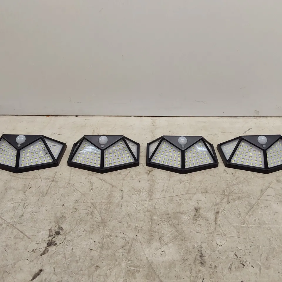 4X BOXED BUILDCRAFT 400 LUMENS SOLAR SECURITY LIGHT WITH CRACKS AND FAULTS (2 BOXES TAPED TOGETHER)