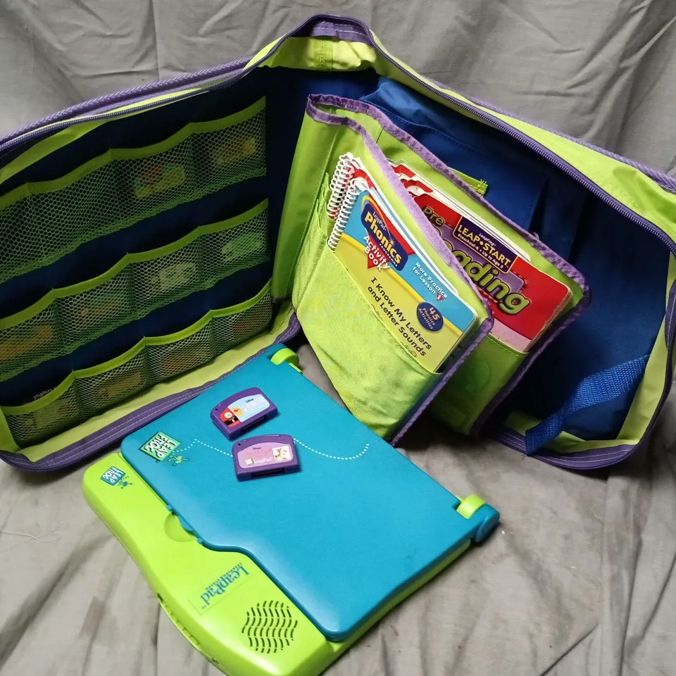 LEAP FROG LEARNING SYSTEM IN BINDER WITH BOOKS AND 12 GAMES