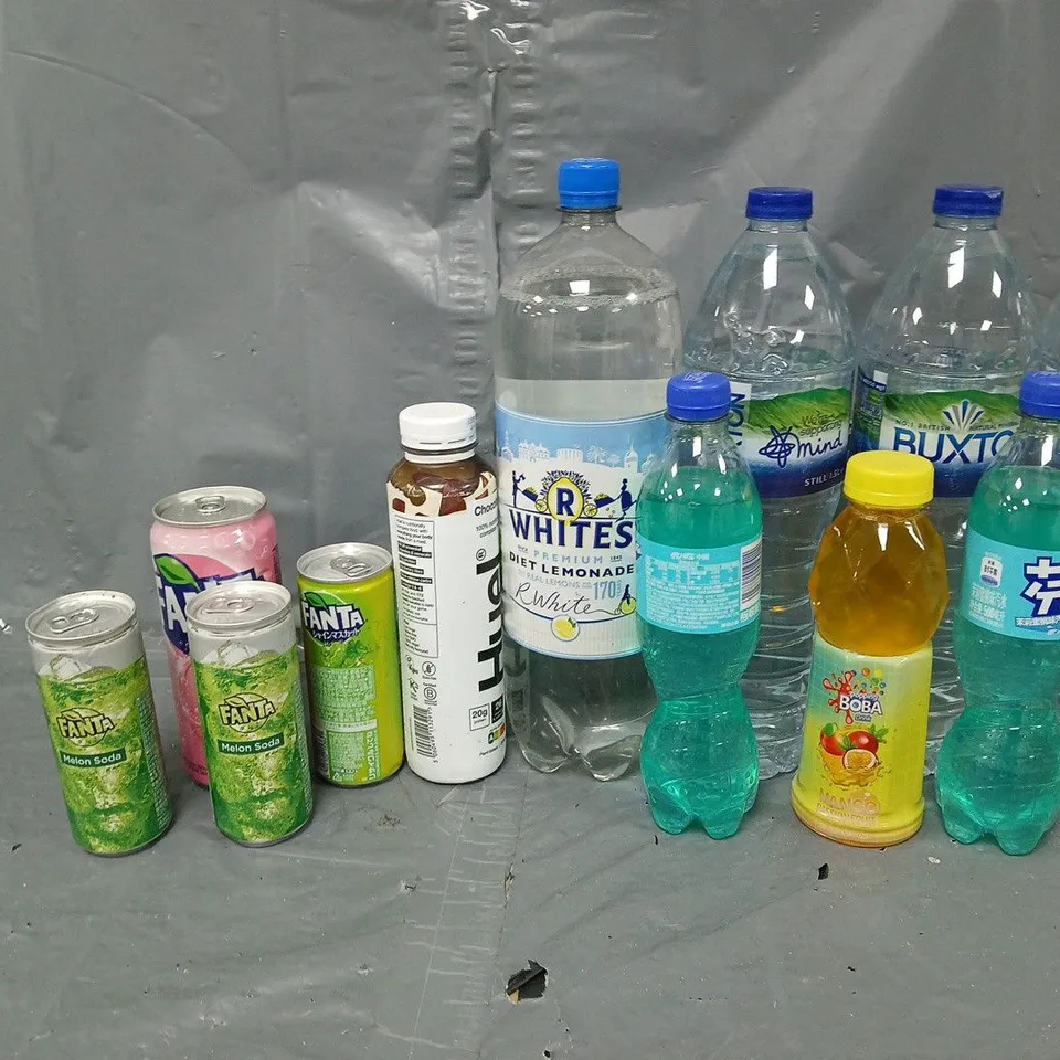TOTE OF APPROXIMATELY 10 ASSORTED DRINKS ITEMS TO INCLUDE - BUCTON WATER, FANTA, AND HUEL CHOCOLATE ETC. 