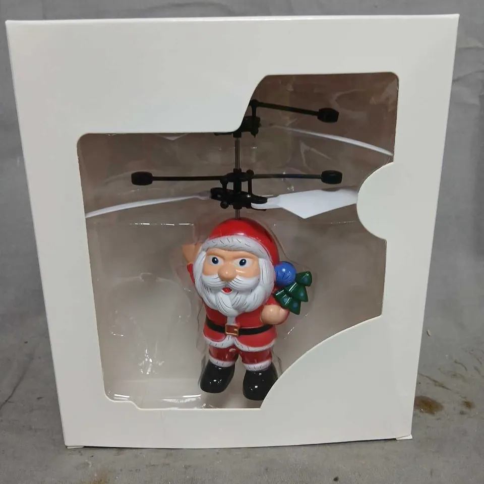 PALLET OF APPROXIOMATELY 900 FKYING SANTA TOYS