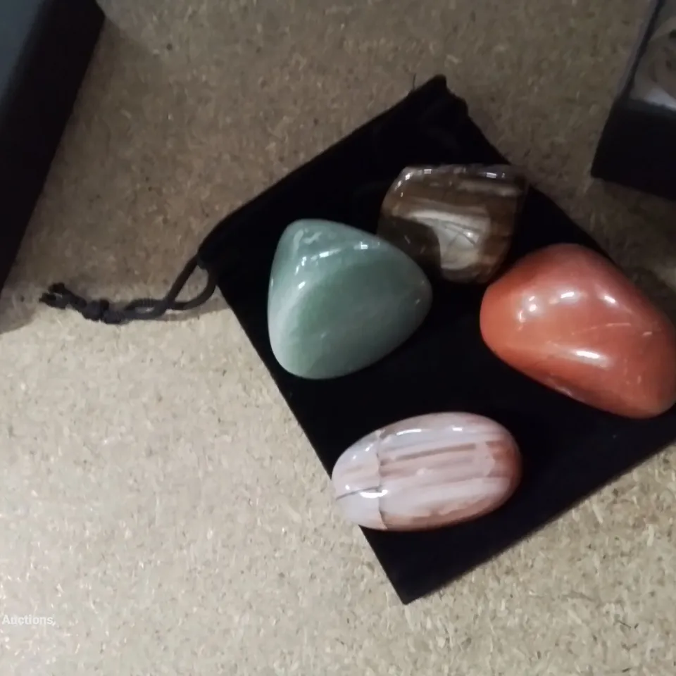 A BOX OF APPROXIMATELY 65 HEALING CRYSTAL SETS 