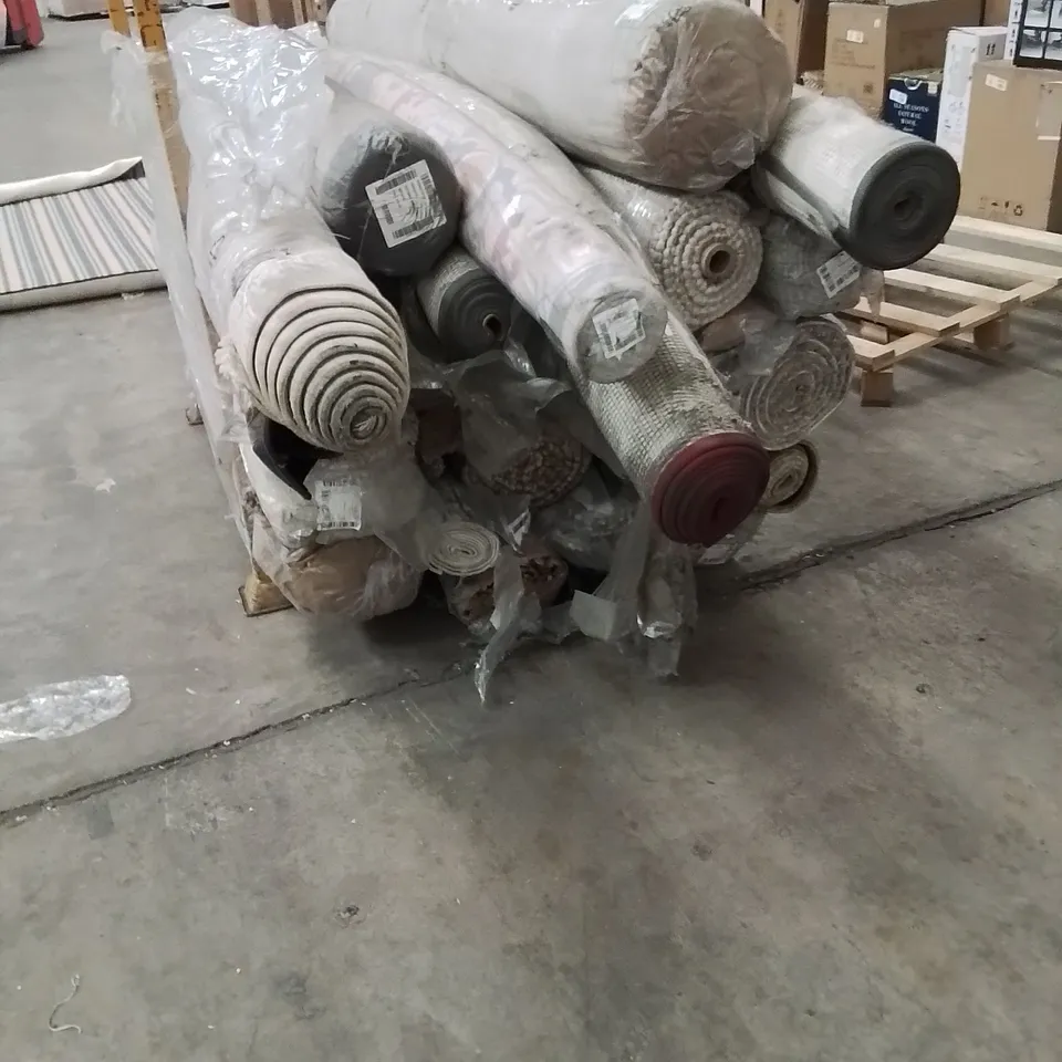 STILLAGE OF APPROXIMATELY 20 BAGGED QUALITY AREA RUGS