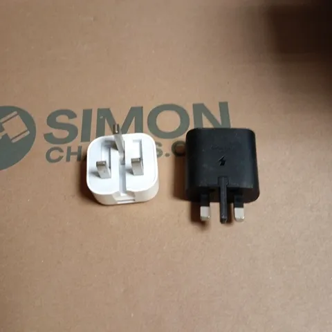 BOX OF APPROXIMATELY 100 ADAPTER PLUGS 