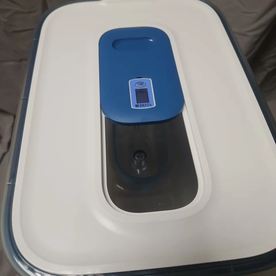 BRITA WATER FILTER JUG WITH BLUE LID AND POUR TAP