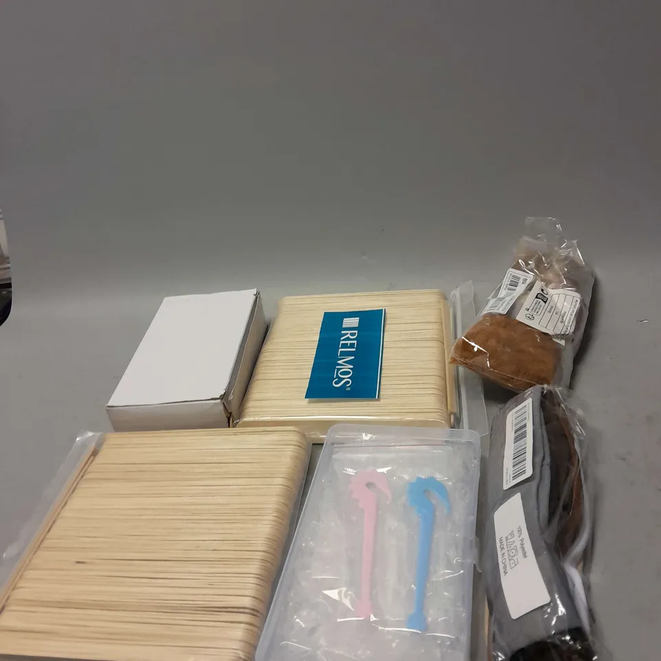 APPROXIMATELY 12 ASSORTED COSMETICS AND BEAUTY ITEMS TO INCLUDE MAKEUP STICKS , HEEL GRIPS , TANNING MITTS   , ETC 