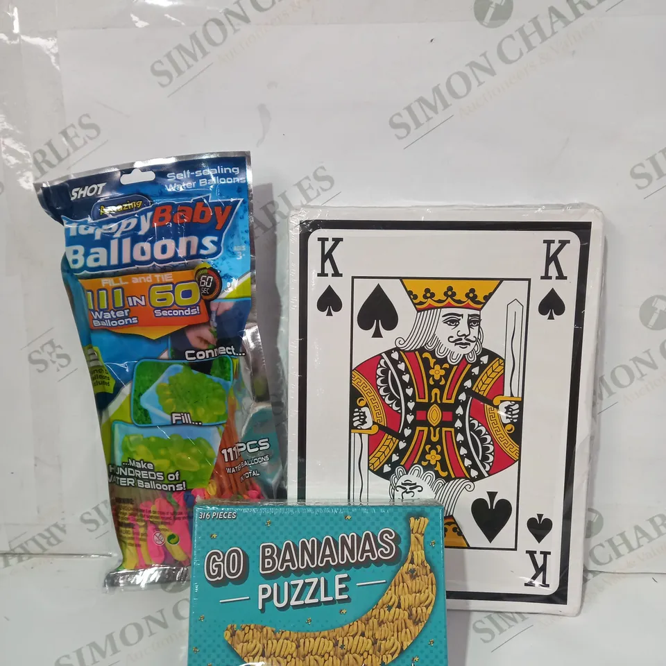 BOX OF APPROXIMATELY 10 ASSORTED TOYS AND GAMES TO INCLUDE GO BANANAS PUZZLE, JUMBO SIZE PLAYING CARDS, HAPPY BABY BALLOONS, ETC