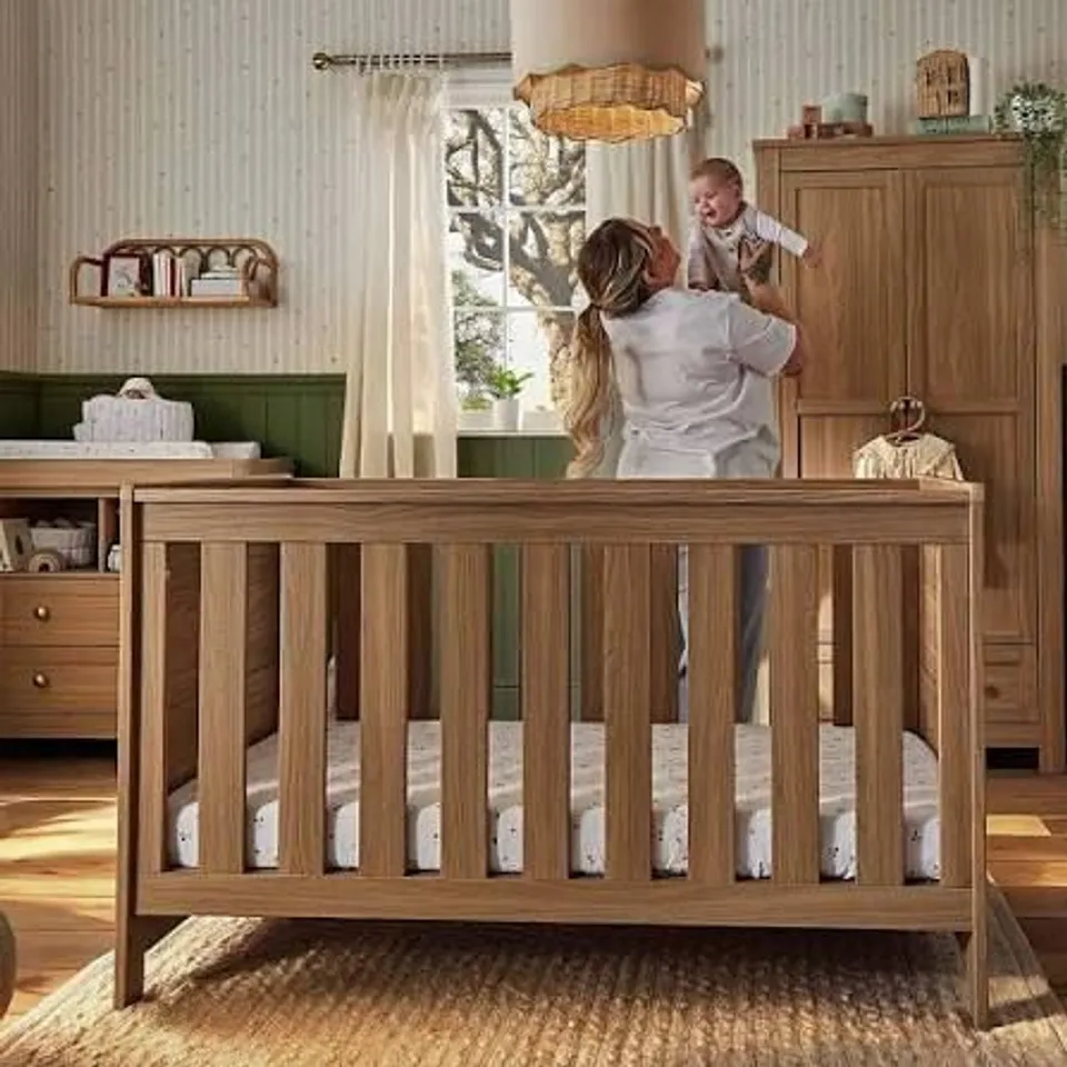 BOXED CUDDLE CO. BURFORD COT BED - OAK (2 BOXES)