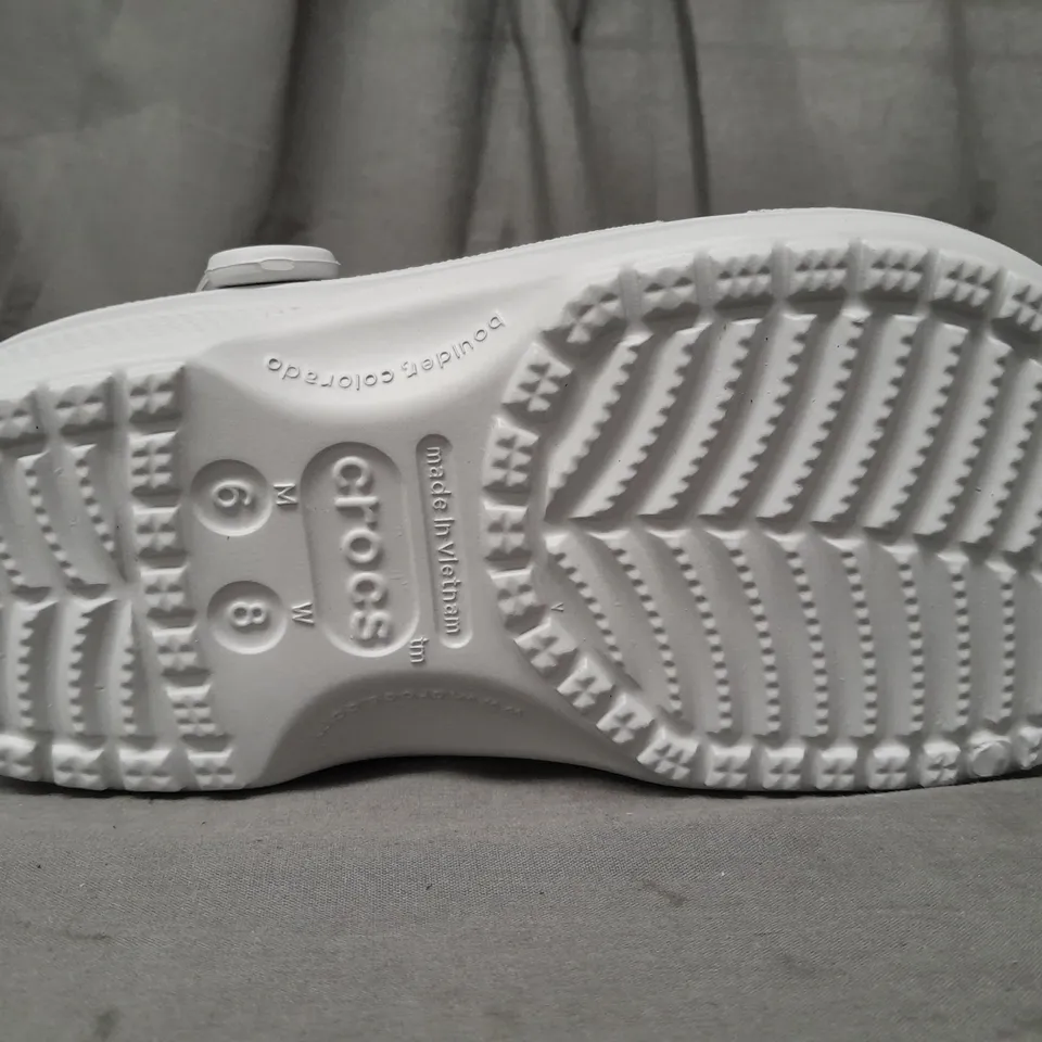 PAIR OF CROCS CLASSICS IN GREY UK SIZE M5/W6