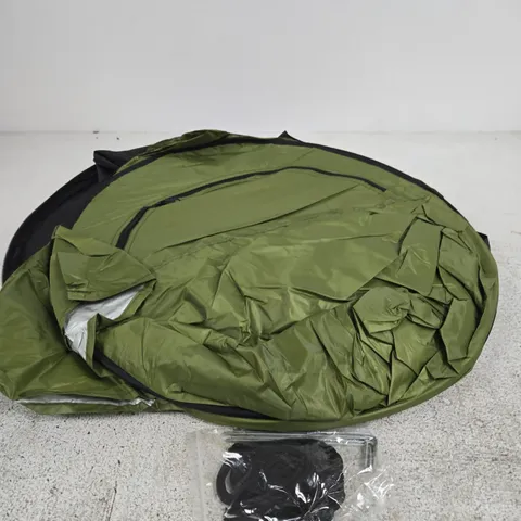 FOLDED-UP GREEN PORTABLE POP-UP PRIVACY TENT