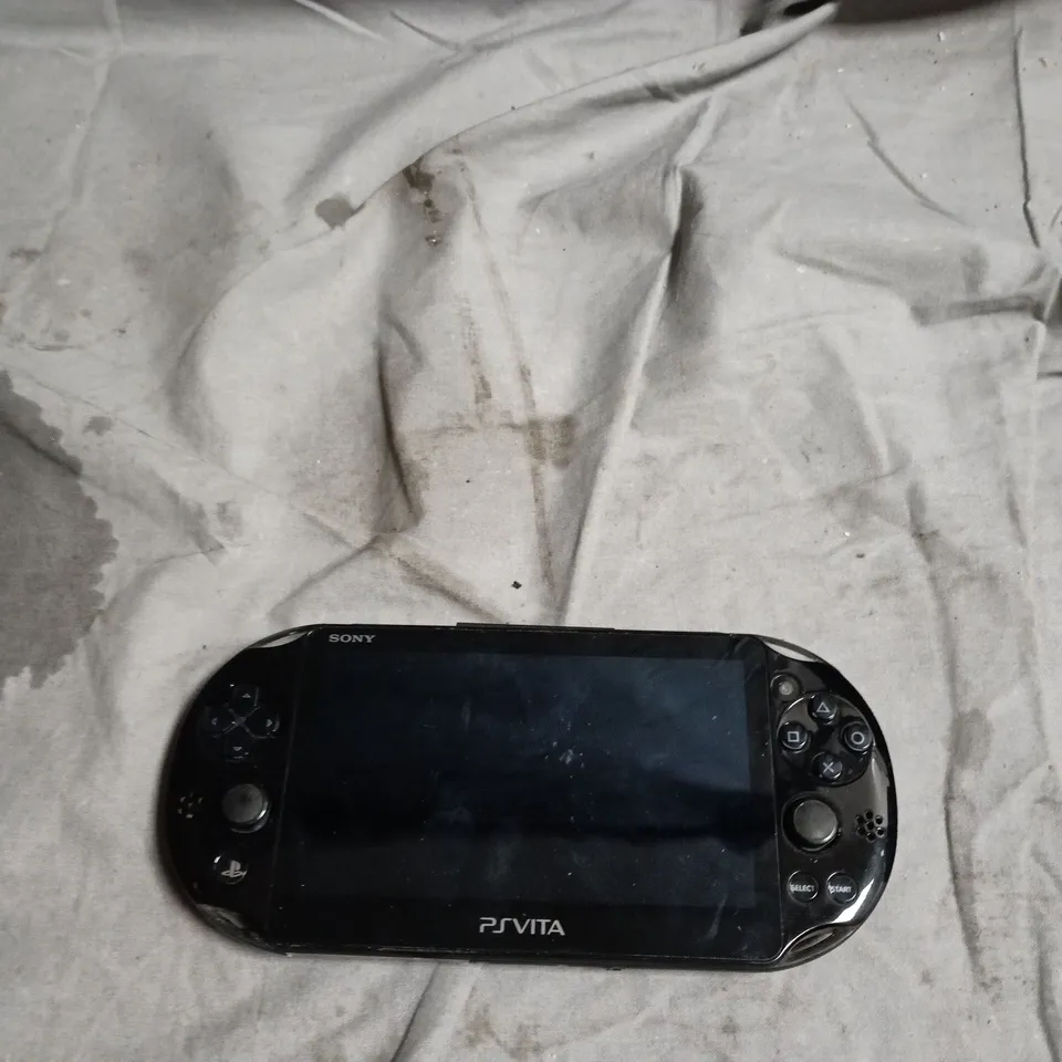 PS VITA HAND HELD CONSOLE 
