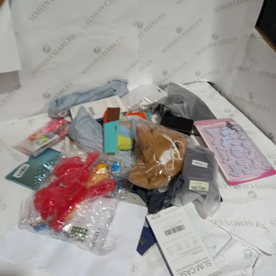 LOT OF 10 ITEMS TOO INCLUDE PHONE CASES AND HIP, RESISTANCE BANDS CAKE CUTTER MOLDS 