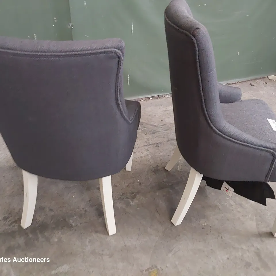 PAIR OF UPHOLSTERED BUTTONED BACK DINING CHAIRS CHARCOAL FABRIC ON WHITE PAINTED LEGS 