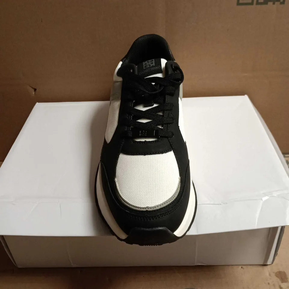 BOXED PAIR OF KURT GEIGER TRAINERS – BLACK & WHITE - UK 9