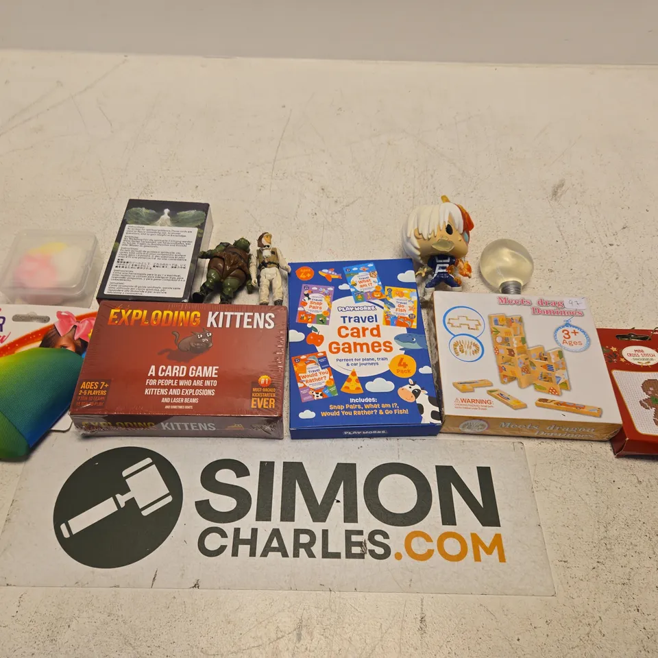 LARGE QUANTITY OF TOYS AND ACCESSORIES TO INCLUDE; FUNKO POP FIGURE, MINI CROSS STITCH, EXPLODING KITTENS, HAIR BOW AND ANGEL NUMBER ORACLE CARDS