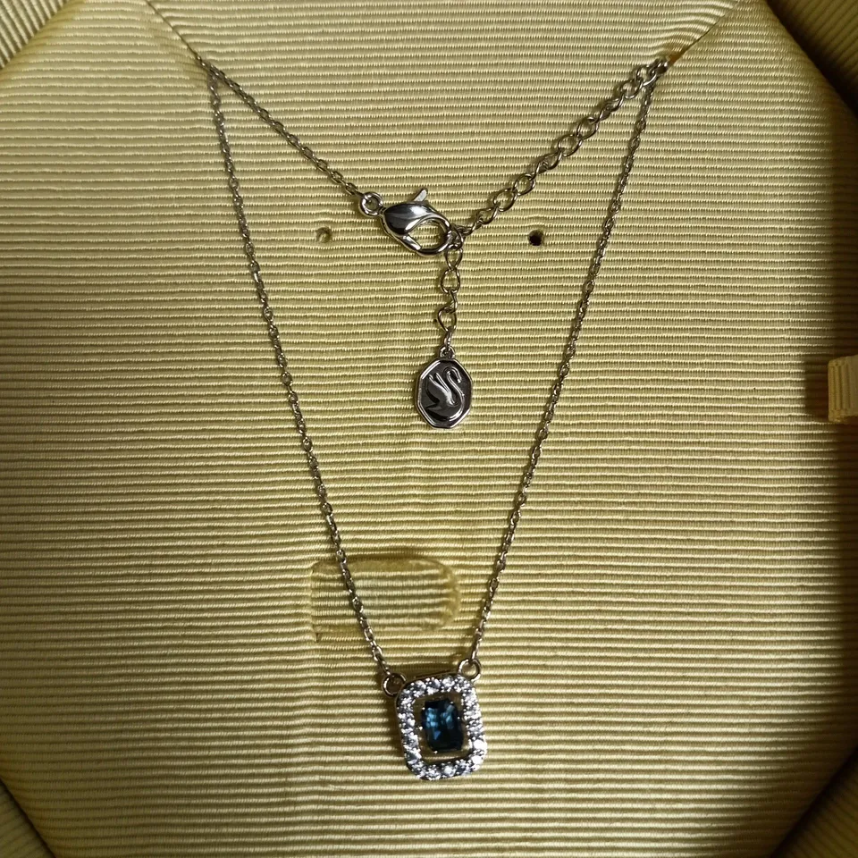 SWAROVSKI SILVER NECKLACE WITH BLUE GEMSTONE HALO PENDANT
