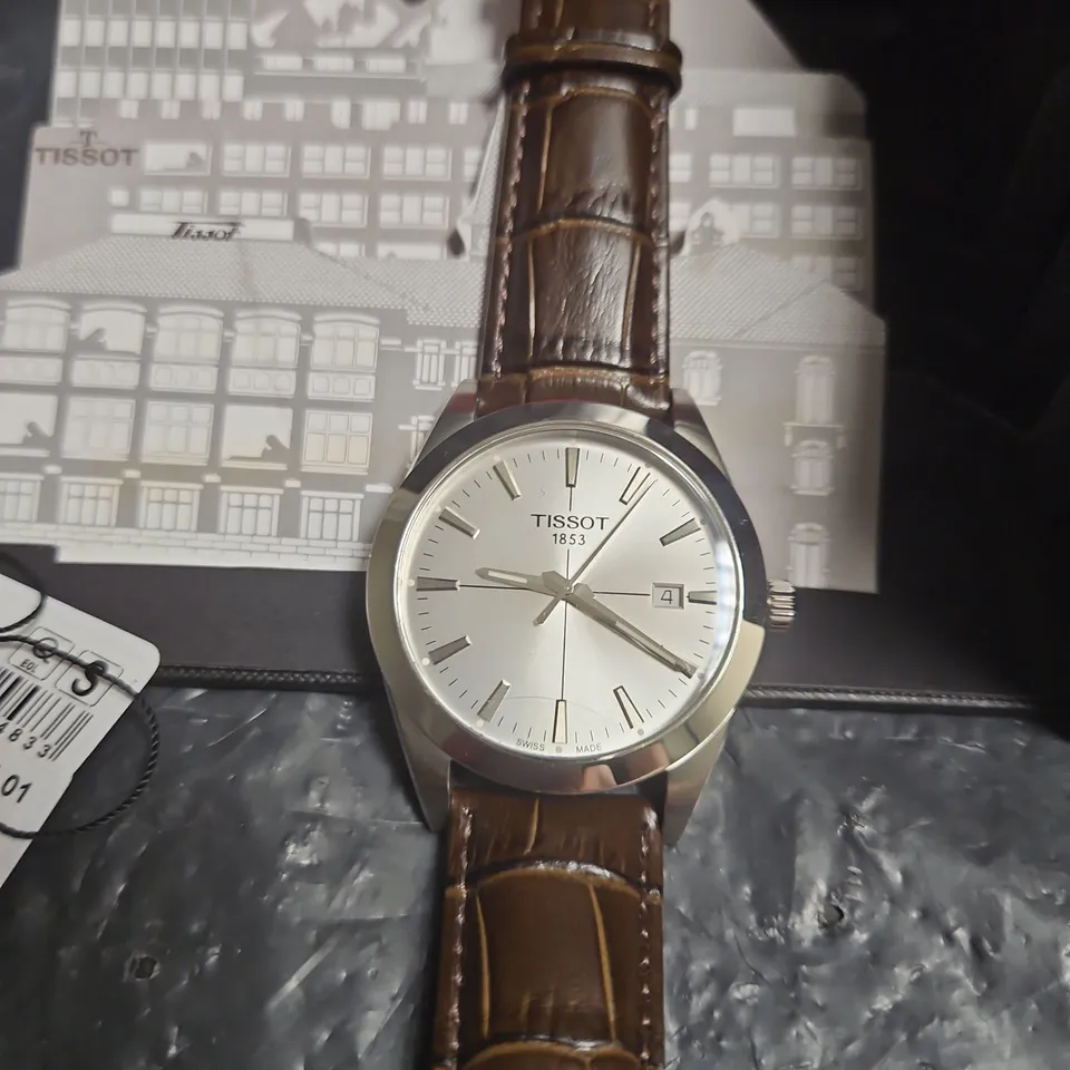 TISSOT GENTLEMAN WRISTWATCH – SILVER DIAL, BROWN LEATHER STRAP