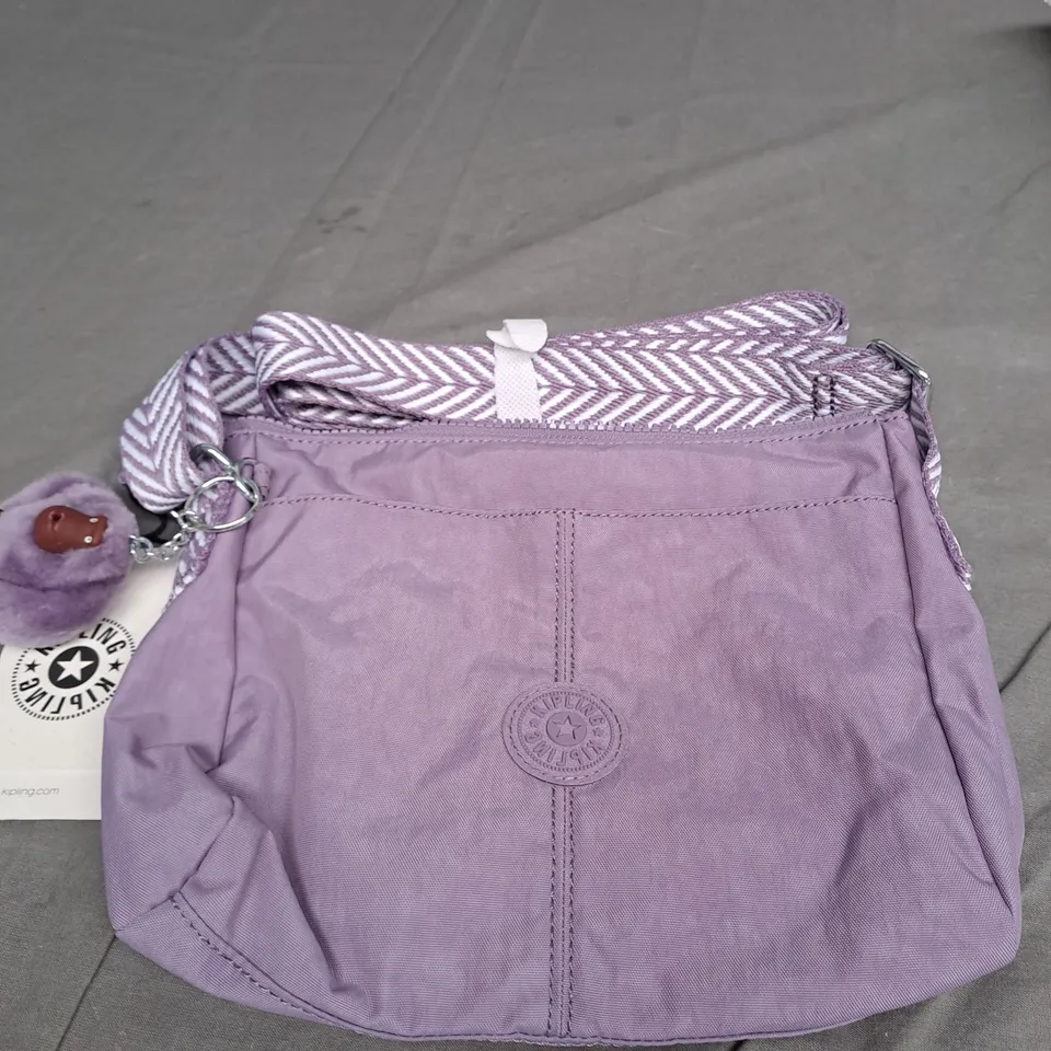 APPROXIMATELY 15 CLOTHING ITEMS TO INCLUDE DANNII MINOGUE TOPS AND A KIPLING BAG
