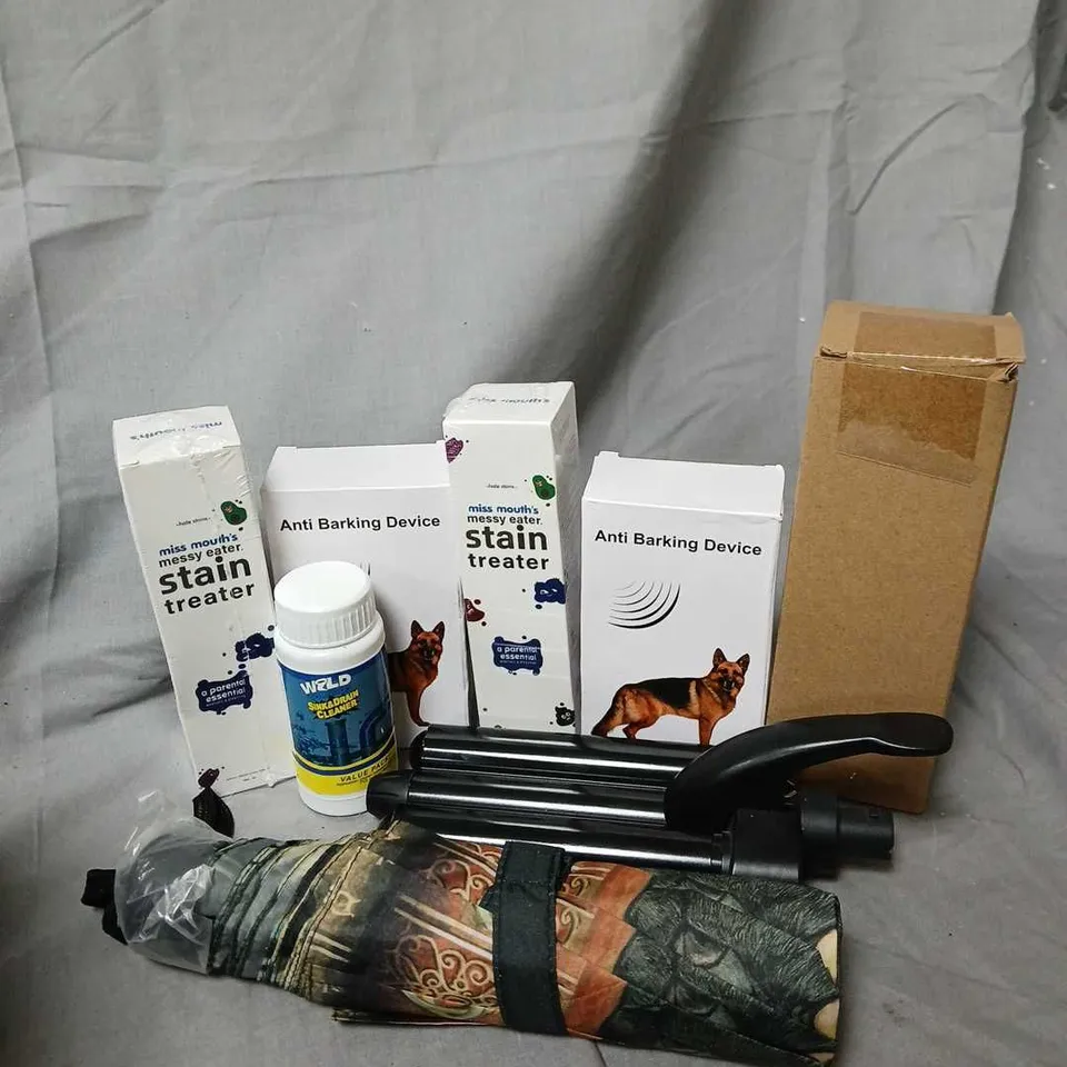 APPROXIMATELY 12 ASSORTED HOUSEHOLD ITEMS TO INCLUDE UMBRELLA, STAIN TREATER, ANTI BARKING DEVICE, ETC